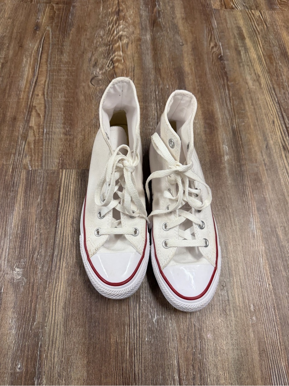 White Converse high top sneakers with red trim, size US 7
